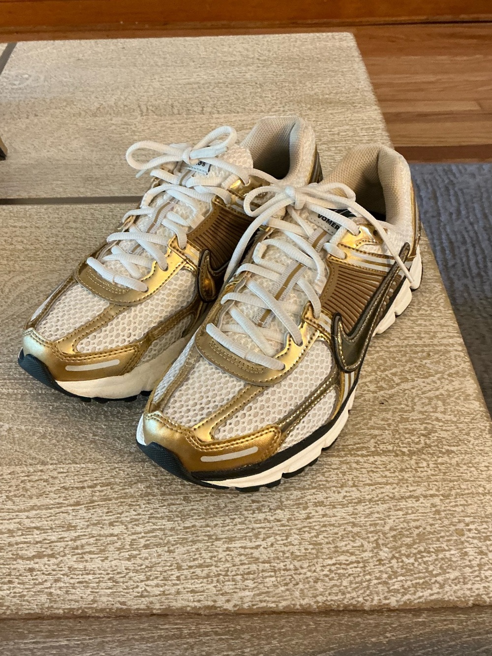 Nike Women’s Vomero in White and Gold Metallic